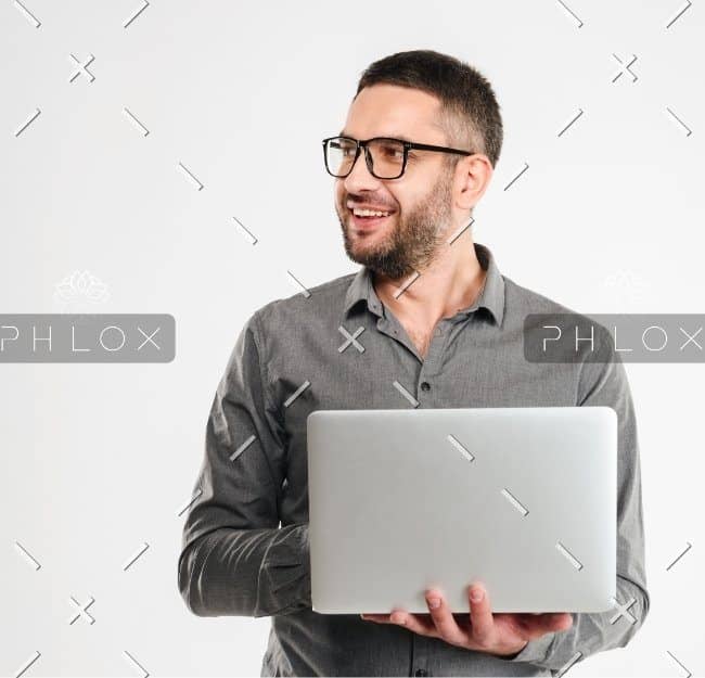 demo-attachment-23-concentrated-businessman-using-laptop-computer-PE3ARHB